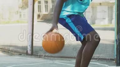 运动员打篮球，熟练地运球绕过对手，运动